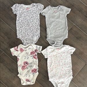 Set of Four Baby Onesies for Baby Girl. Size 6-12M